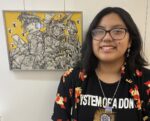Liliana with her pen and ink drawing “Culturally Cluttered” featured in the "Rooted in Relations" art exhibition at MCC during the opening reception on Feb 4, 2026. (Photo: Jasmine Kageyama/The Legend)