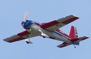 photo of modal plane zipping overhead.