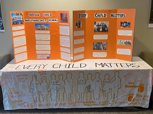 A display outside of the Orange Shirt Day Open Mic with a banner from the 2023 event and two posters from the 2022 event on Sept. 30, 2024 (Photo by Luke Hagen/The Mesa Legend)