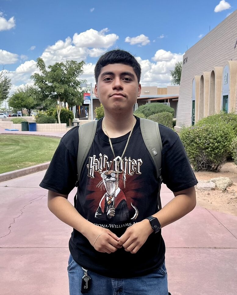 ASMCC presidential candidate Andres de la Cruz Castro stands outside in front of campus. (Photo: Penelope Media/The Legend)