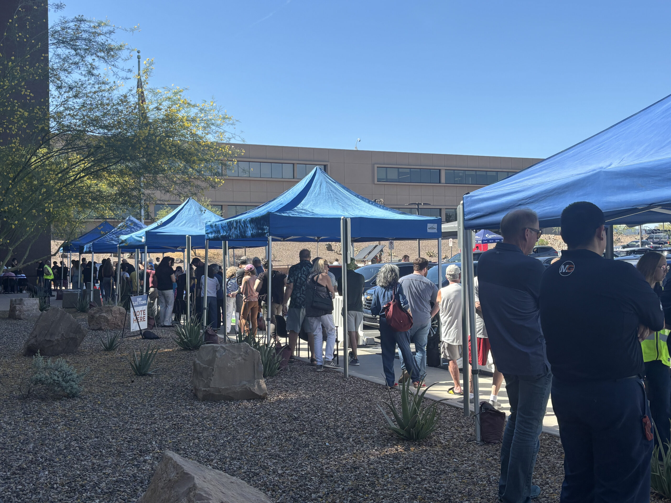 Voters waiting in line outside of the SRP headquarters in Tempe on April 7, 2025, the last day to drop off ballots. (Photo: Gwendolyn Owen/The Legend)